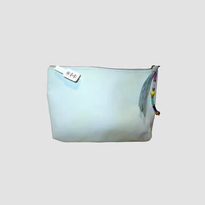 A small light blue zippered pouch with a white brand tag and a colorful beaded tassel zipper pull, shown against a plain light gray background.